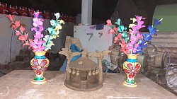 clay hut and flower wise